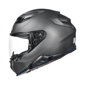Black motorcycle helmet with clear visor on a white background