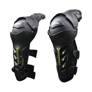 AXOR Impact-X black knee guards with yellow accents, dual-axis bionic design, and hard shell protection.
