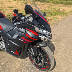 Three-quarter front view of Aprilia RS 457 with black and red bodywork