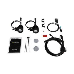 DENALI D2 v2.0 LED motorcycle light kit with pods, wiring harness, switch, lenses, and manual.