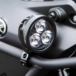 DENALI D3 LED motorcycle driving light with black housing and triple Cree LED spot beam lens.