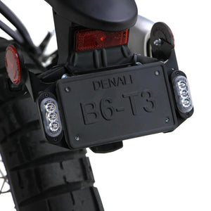 DENALI T3 modular LED rear turn signal pods with red brake and amber indicator lights mounted on a motorcycle.