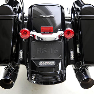 DENALI T3 modular LED rear signal pods mounted on a motorcycle fender for brake and turn signal visibility.
