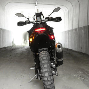 DENALI T3 modular LED rear turn signal pods with red brake and amber indicator lights on a motorcycle.