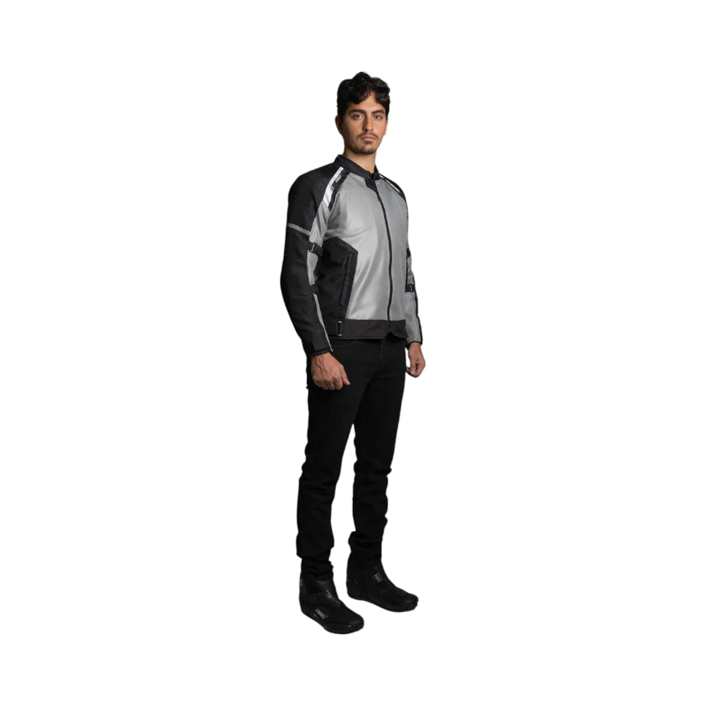 Person wearing a black and gray jacket on a white background