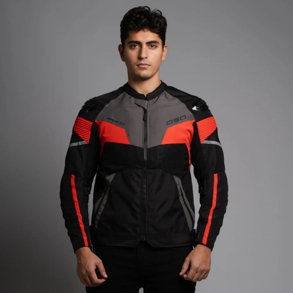 Man wearing a black and red jacket with 'DSG' branding on a gray background, DSG Apex V2 Riding Jacket with CE Level 2 armor and AA safety certification