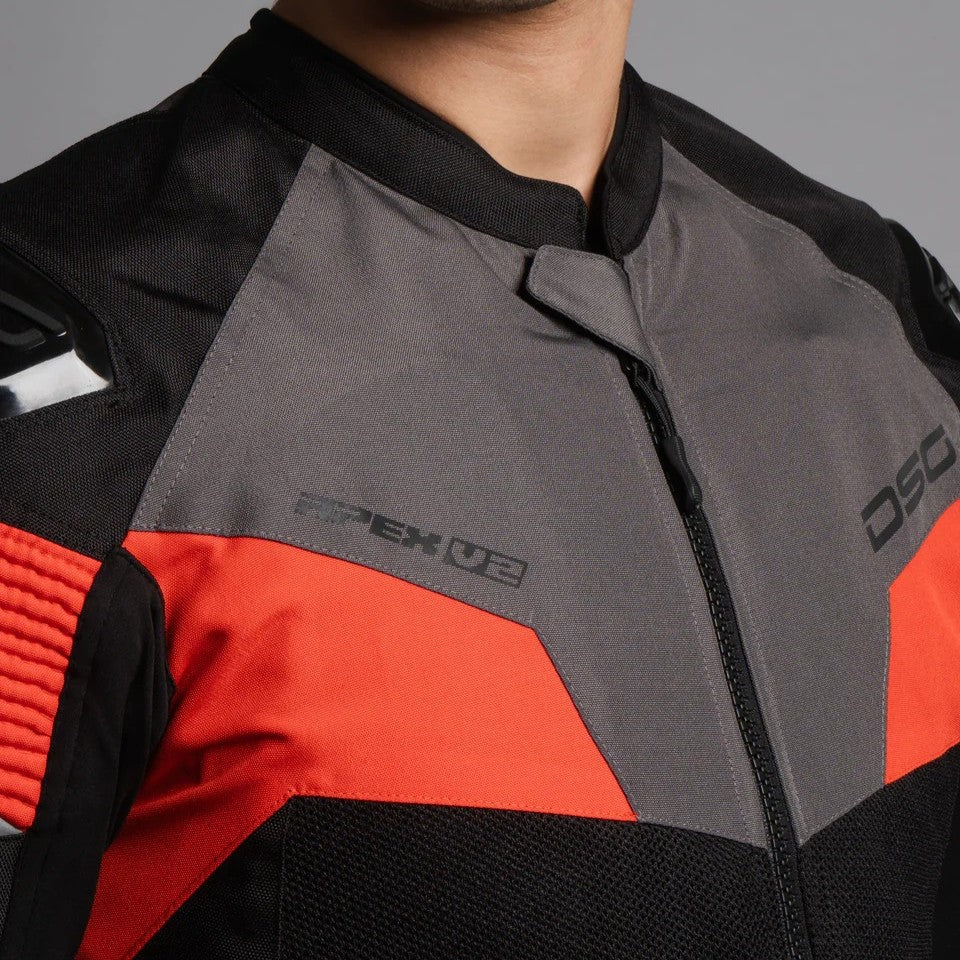 Close-up of a black, gray, and red jacket with DSG branding on a gray background, DSG Apex V2 Riding Jacket with CE Level 2 armor and AA safety certification