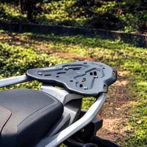 Legundary Genesis black aluminium carrier plate mounted on a TVS Apache RTX 300 motorcycle rear