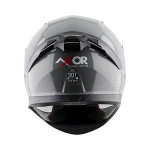 Motodrift Axor Apex solid grey full-face motorcycle helmet viewed from the back with DOT certification label