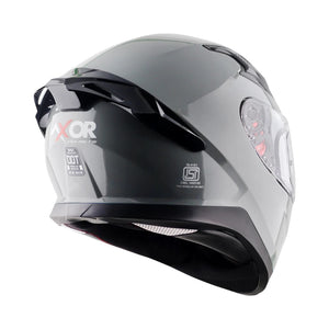 Motodrift Axor Apex solid grey full-face motorcycle helmet viewed from the rear showing spoiler and safety markings