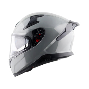 Motodrift Axor Apex solid grey full-face motorcycle helmet with aerodynamic spoiler and clear visor, side profile view.