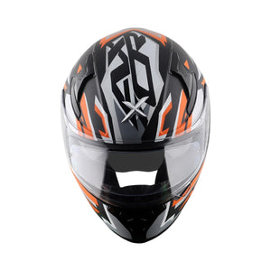 Motodrift Axor Apex Streak full-face helmet in black, grey, and orange with futuristic angular prism graphic design.