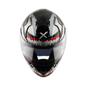 Motodrift Axor Apex Marvel Venom full-face motorcycle helmet with black and white graphic design and clear visor