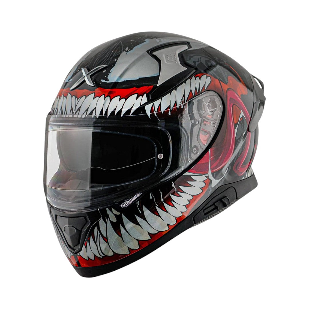 Motodrift Axor Apex Marvel Venom full-face motorcycle helmet with black, white, and red graphic design.