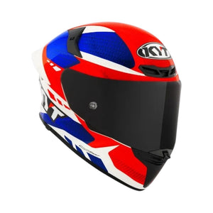 Motodrift KYT TT Revo Gear full-face motorcycle helmet in red, white, and blue with a dark tinted visor