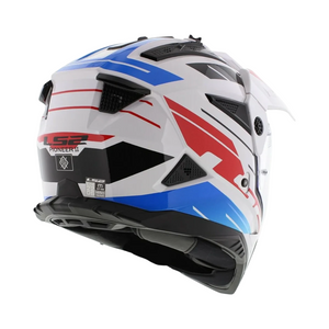 Motodrift LS2 MX436 Pioneer II dual-sport helmet in white, blue, and red with an adjustable peak and rear vents.