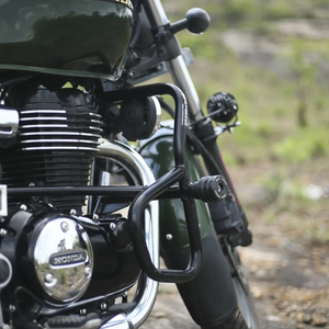 Motodrift Moto Torque V2.0 black steel crash guard installed on a Honda CB350 motorcycle with protective sliders.