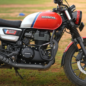 Motodrift Moto Torque V2.0 black steel crash guard installed on a red and white Honda CB350 RS motorcycle
