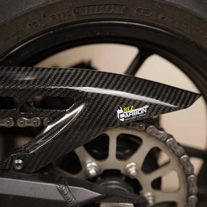 RLZ carbon fiber rear hugger with integrated chain guard in a glossy twill finish for Kawasaki Z900.