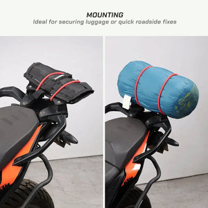 ViaTerra red bungee cord securing luggage and a sleeping bag to a motorcycle rear rack