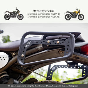 ViaTerra matte black steel saddlebag rack mounted on a Triumph Scrambler 400 X motorcycle