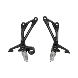 Black motorcycle rearset footrest assembly for Kawasaki Z900 with textured silver pegs