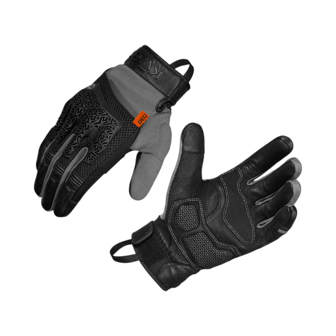 Pair of Korda black and gray gloves on a white background