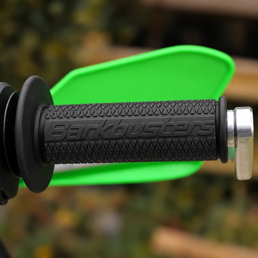 Barkbusters black dual-compound rubber motorcycle handlebar grips with diamond pattern and bar end mount
