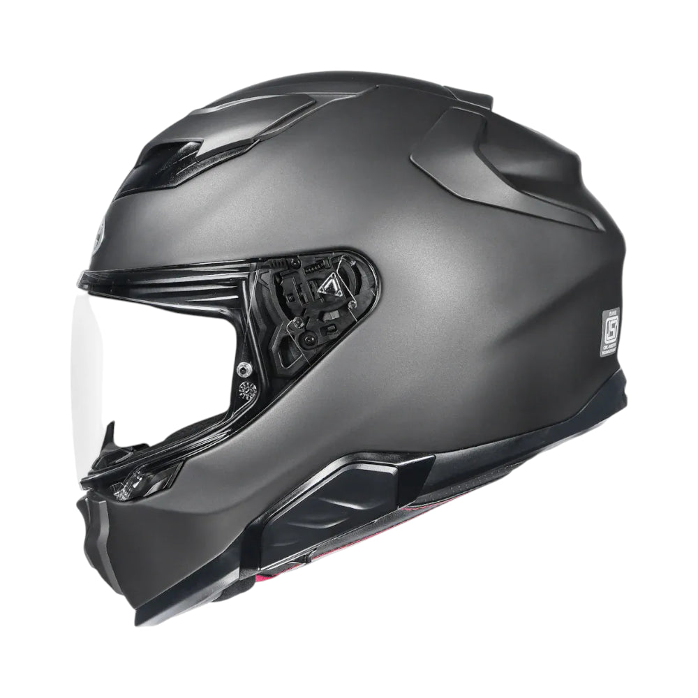 Black motorcycle helmet with clear visor on a white background