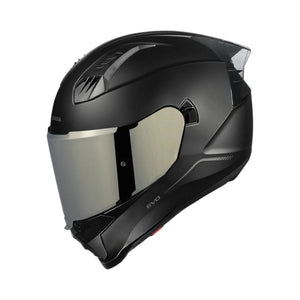 Motodrift Korda Evo Solid full-face motorcycle helmet in matte black with a clear visor and aerodynamic shell design.