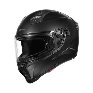 Motodrift Korda Evo Solid full face motorcycle helmet in matte black with a clear visor and aerodynamic design.