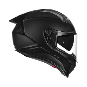 Motodrift Korda Evo Solid full-face motorcycle helmet in matte black with a clear visor and integrated sun shield.