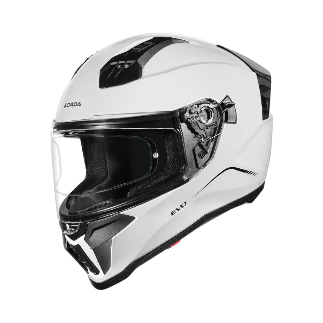 Motodrift Korda Evo Solid full face motorcycle helmet in gloss white with a clear visor and aerodynamic design