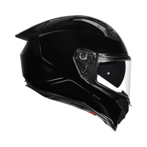 Motodrift Korda Evo Solid full-face motorcycle helmet in gloss black with a clear visor and integrated sun shade.