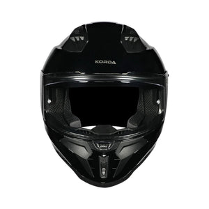 Motodrift Korda Evo Solid full face motorcycle helmet in glossy black with clear visor and ventilation ports