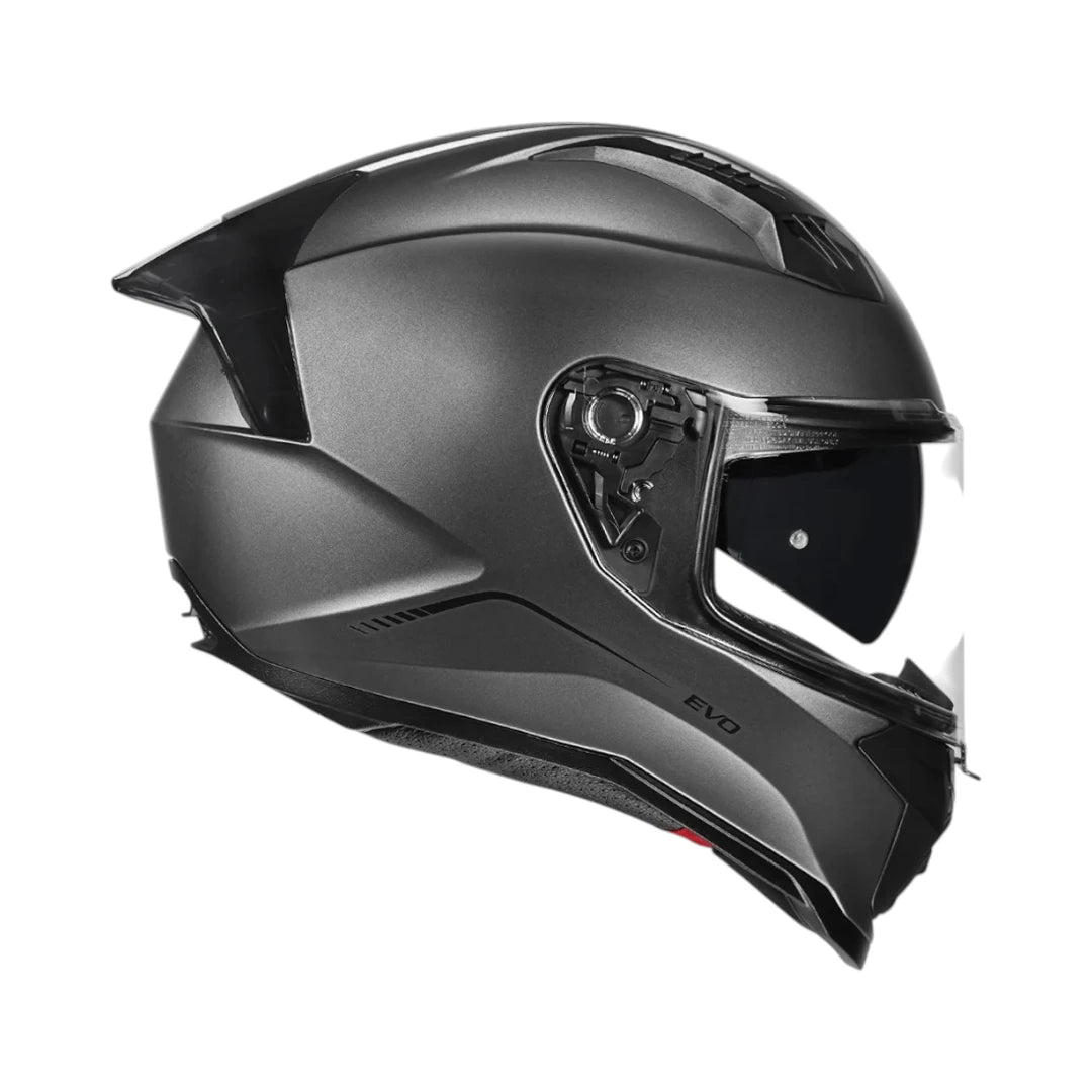 Motodrift Korda Evo Solid full face motorcycle helmet in matt grey with a clear visor and integrated sun shield