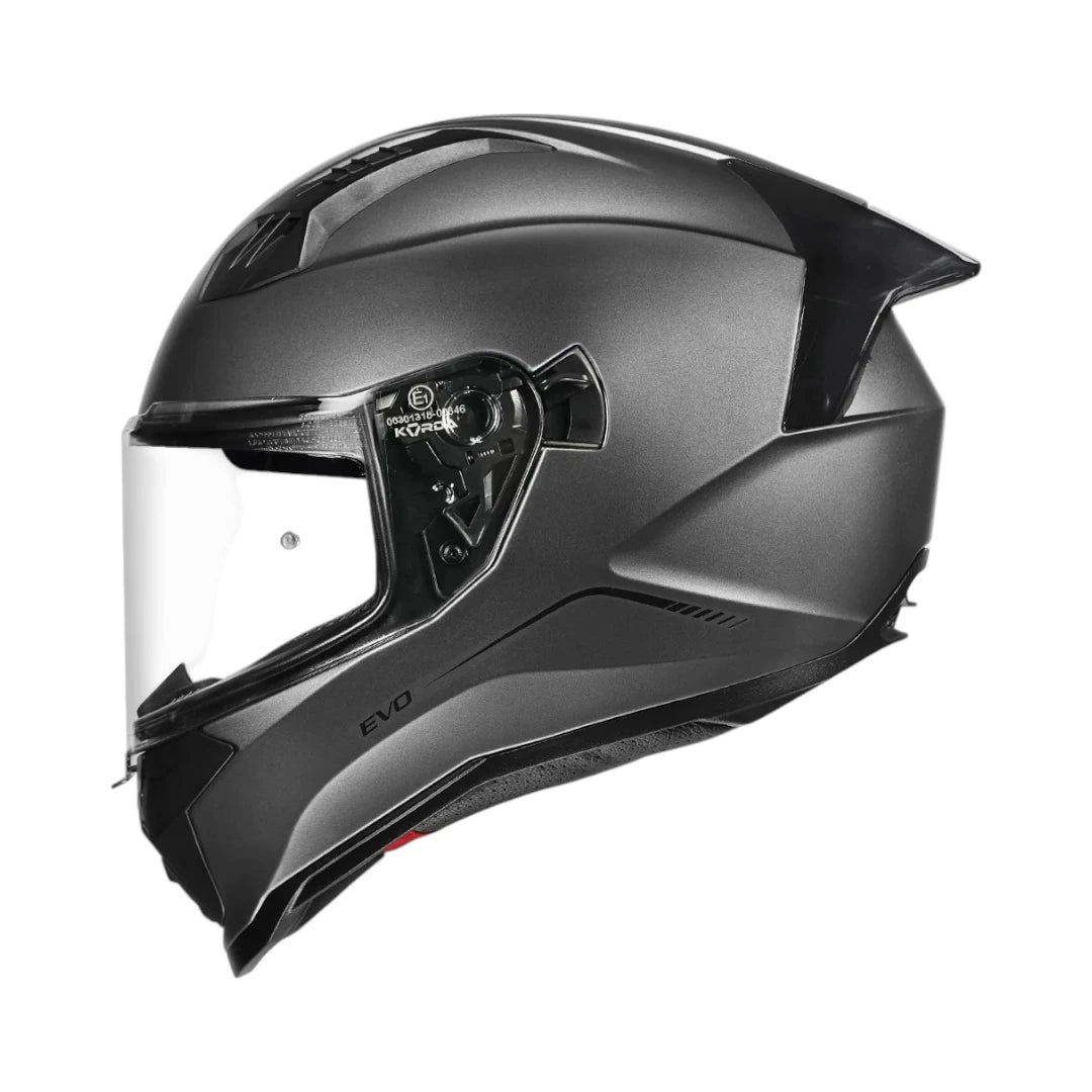 Motodrift Korda Evo Solid full face motorcycle helmet in matt grey with clear visor and aerodynamic shell design