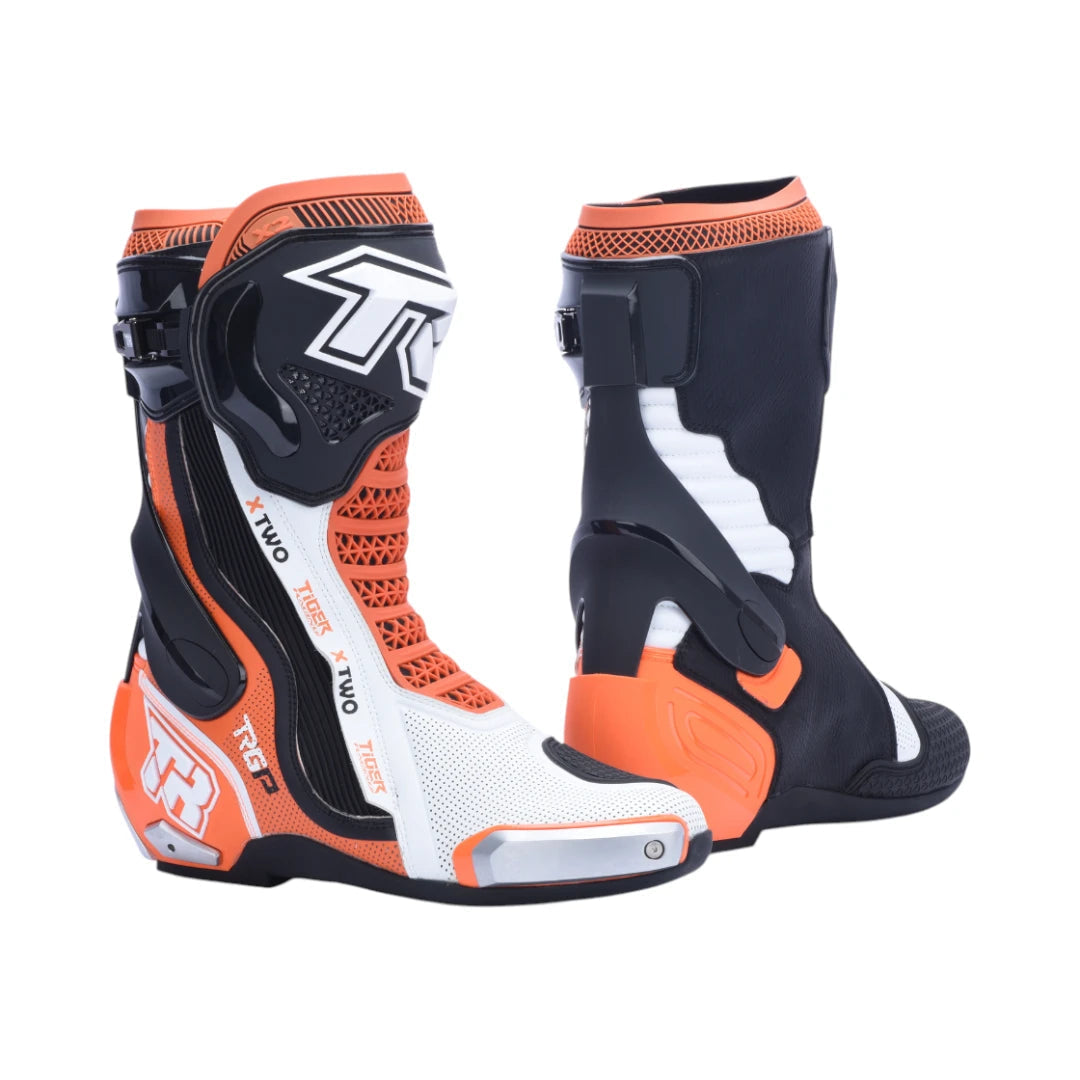 TR TIGER X TWO motorcycle racing boots in black, white, and orange with titanium sliders and ankle support.
