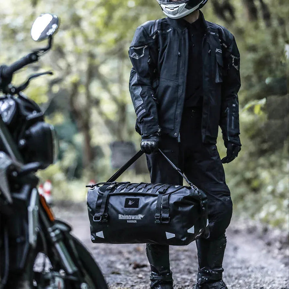 Motodrift Rhinowalk Warrior Series X waterproof motorcycle duffel bag in black 500D polyester with roll-top closure.