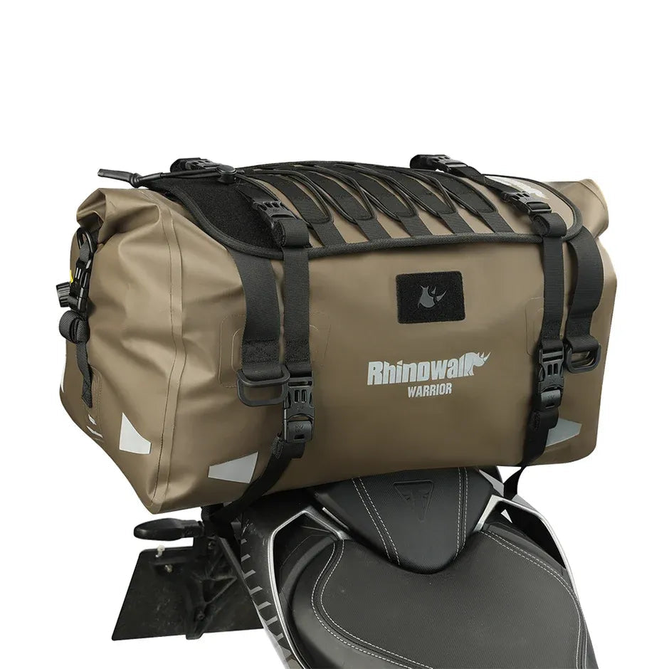 Motodrift Rhinowalk Warrior waterproof motorcycle roll-top duffel bag in olive green mounted on a bike seat.