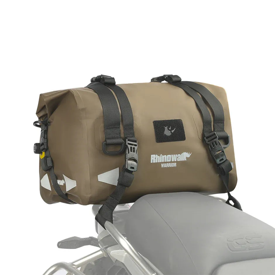 Motodrift Rhinowalk Warrior waterproof motorcycle roll-top duffel bag in olive green mounted on a bike seat.