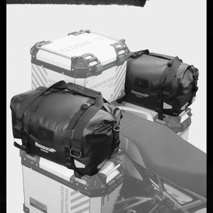 Motodrift Rhinowalk Warrior Series waterproof black motorcycle duffel bags mounted on adventure bike panniers
