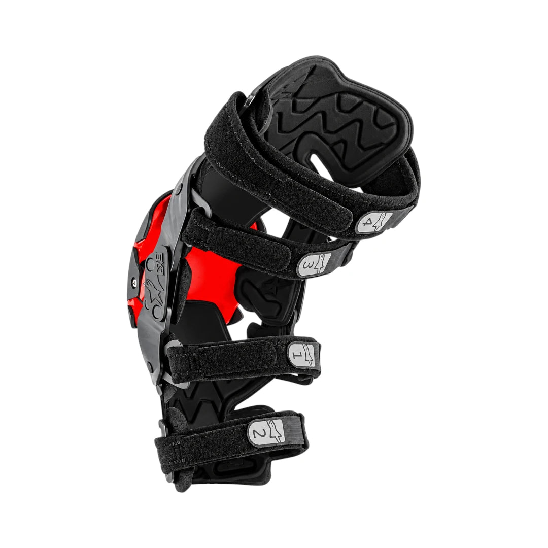 Alpinestars RK-1 Plasma knee brace in black and red with articulated hinge and adjustable straps