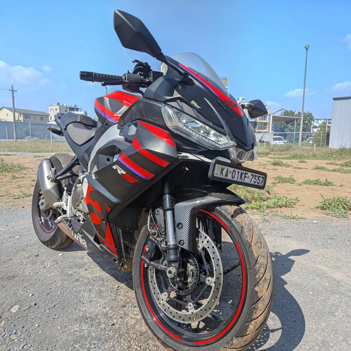 Side view of Aprilia RS 457 showing the front fender and front wheel assembly