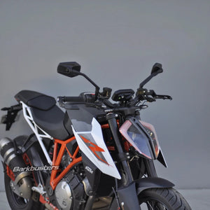 Barkbusters AERO-GP lever protectors installed on a KTM motorcycle handlebar for street and track use