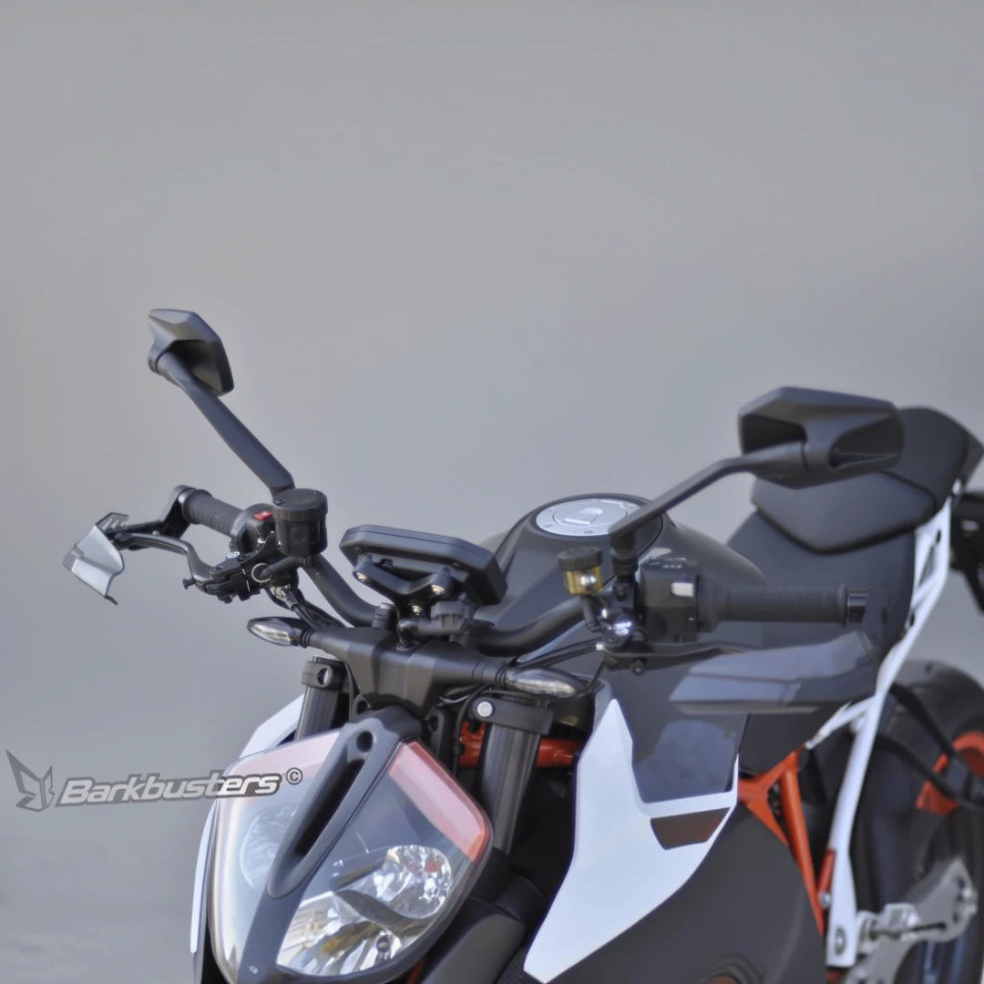 Barkbusters AERO-GP lever protectors installed on a motorcycle handlebar for brake and clutch protection
