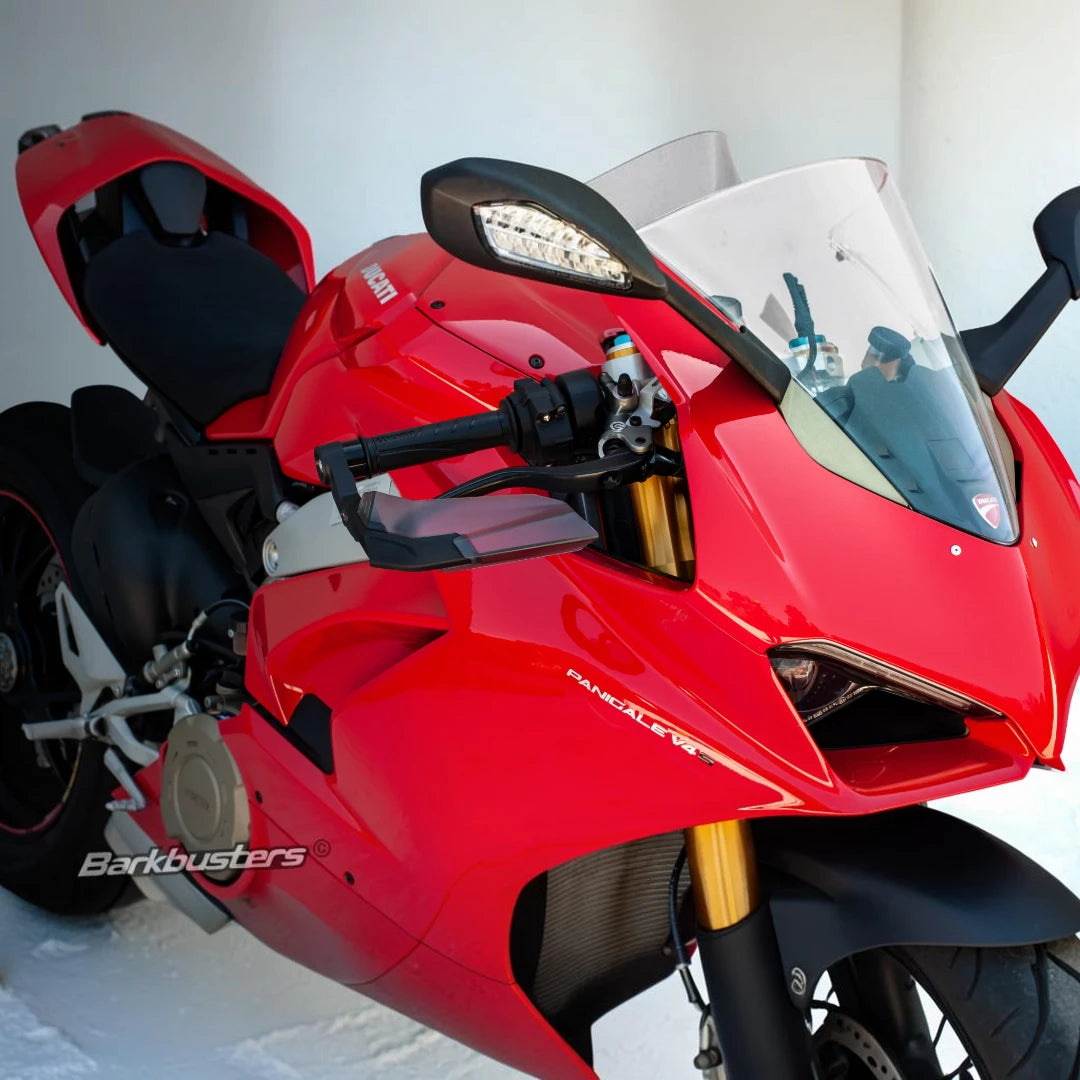 Barkbusters AERO-GP lever protector installed on a red Ducati Panigale V4 sport motorcycle