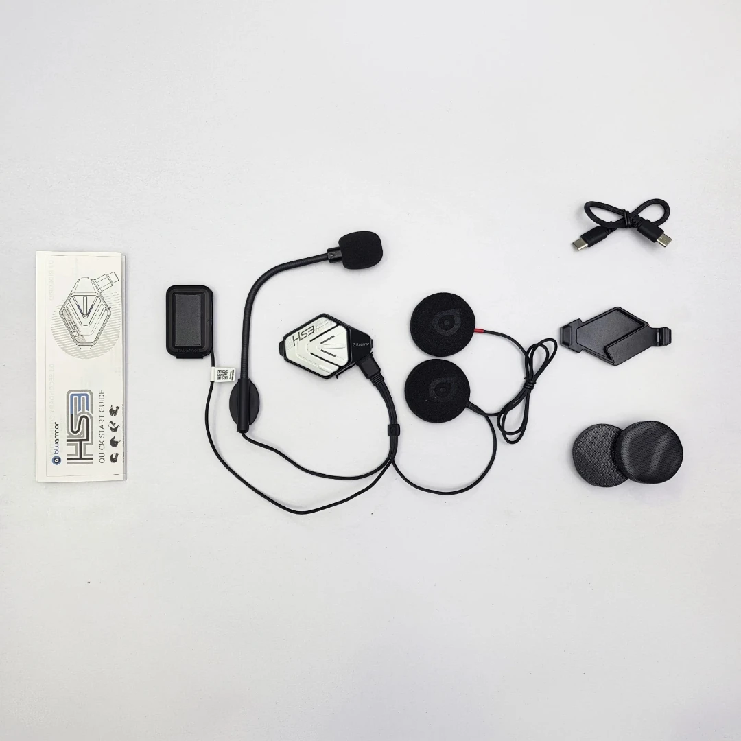 BluArmor HS3 helmet Bluetooth headset kit with speakers, microphone, mounting hardware, and charging cable.
