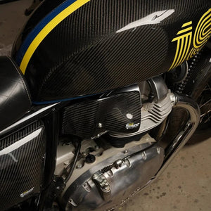 RLZ twill gloss carbon fiber heat shield installed on a Royal Enfield Interceptor 650 engine side cover