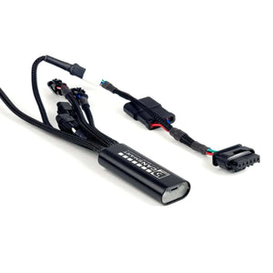 DENALI CANsmart GEN II controller for BMW motorcycles with black wiring harness and plug-and-play connectors.